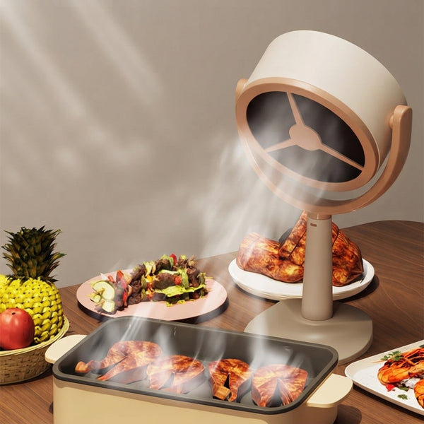 A portable blender filled with soapy water cleaning itself on a peach-colored kitchen countertop.
